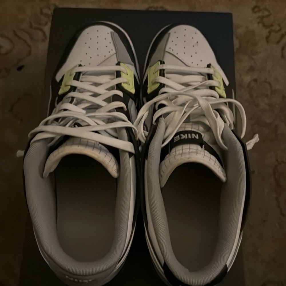 Black, white, grey, lime green.  Size 11 Nike Dunk